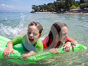 Boy and girl at the Greek seaside