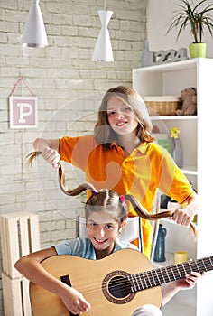 Boy and a girl having fun with music