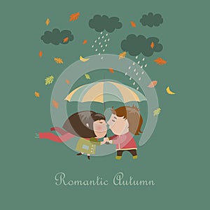 Boy and a girl kissing under umbrella