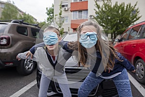 Boy and girl with masks during covid-19 pandemic