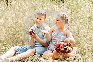 A boy and a girl at a picnic in the park. Overweight
