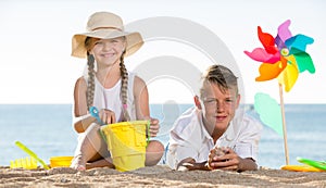 Boy and girl playing beach