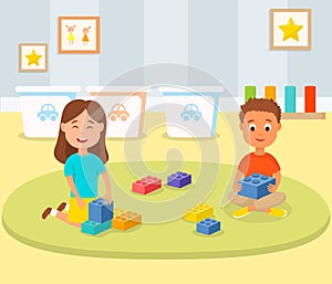 Boy and Girl Playing Building Blocks in Play Room