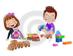 a boy and girl playing with toys and a teddy bear