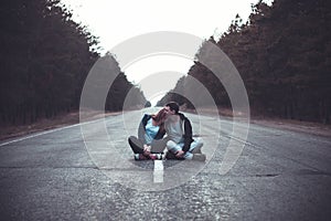 Boy and girl on a road