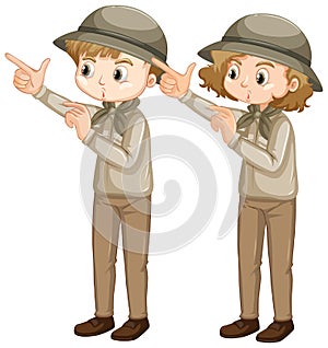 Boy and girl in scout uniform pointing finger