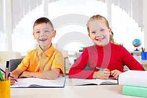 Boy and girl sitting together