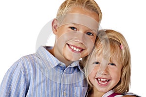 Boy and girl are smiling happy into camera photo