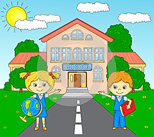 Boy and girl standing near the school building in a schoolyard