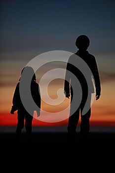 Boy and Girl - Sunset at the Beach