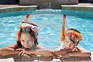 Boy & Girl In Swimming Pool with Goggles & Snorkel