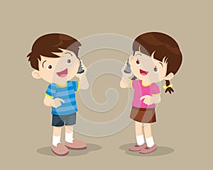 Boy and girl talking on the cell phone