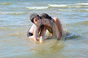 Boy and girl in water