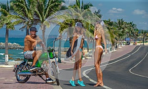 Boy and girls surfers having fun