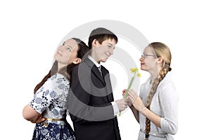 Boy gives flowers to girlfriend