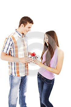 Boy giving present to girl