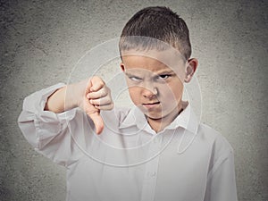 Boy Giving Thumbs Down Gesture photo