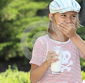 Boy with a glass of milk