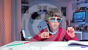 A boy with glasses chews a lot of food, he feels bad