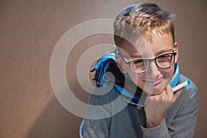 Boy with glasses happy because recovered