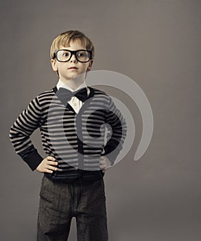 Boy in glasses, little child portrait, kid smart casual clothing