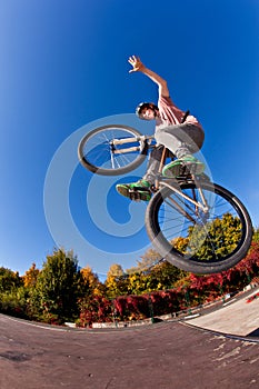 Boy going with his dirt bike