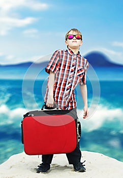 Boy going for sea vacation photo