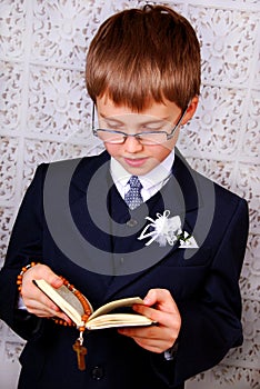 Boy going to the first holy communion