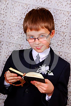Boy going to the first holy communion