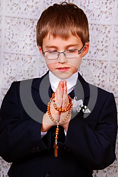 Boy going to the first holy communion