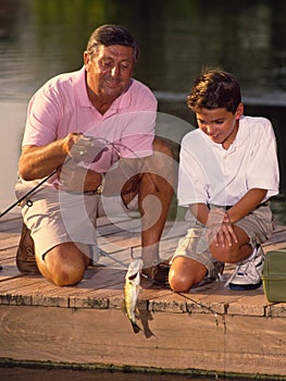 Boy and Grandfather Fishing