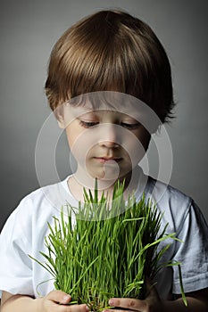 Boy with grass