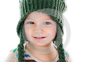 Boy with green winter hat