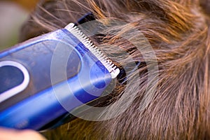 Boy haircut with hairclipper