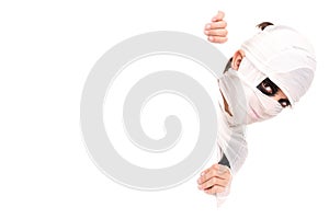 Boy in Halloween mummy costume