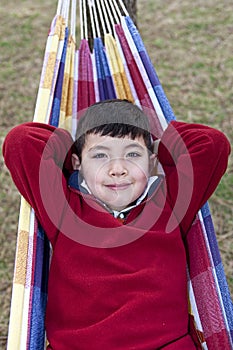 Boy on a hammock.