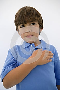 Boy With Hand On Heart