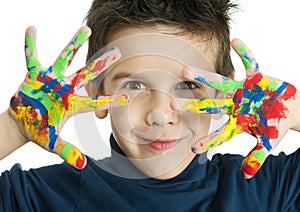 Boy hands painted with colorful paint