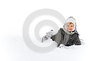 Boy Happily Playing in the Snow