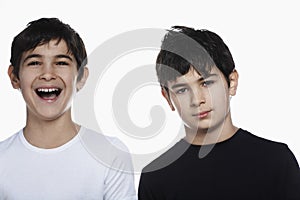 Boy With Happy Brother Against White Background