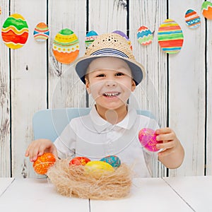 Boy is happy with Easter eggs