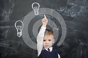 The boy has an idea drawn on the Board light bulb