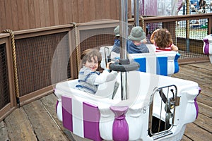 Boy having fun at an amusement park