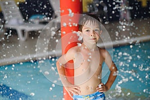 Boy having fun in aqua park