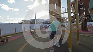 Boy having fun on large playground