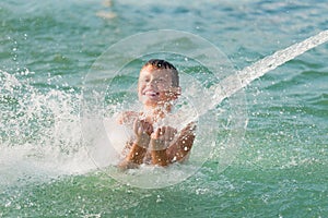 Boy having fun in water