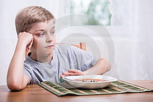 Boy having no appetite photo