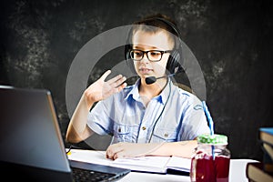 Boy having an online learning class from home