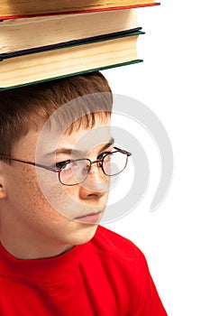 Boy on head with books