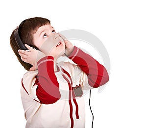 Boy in headphones listen music.